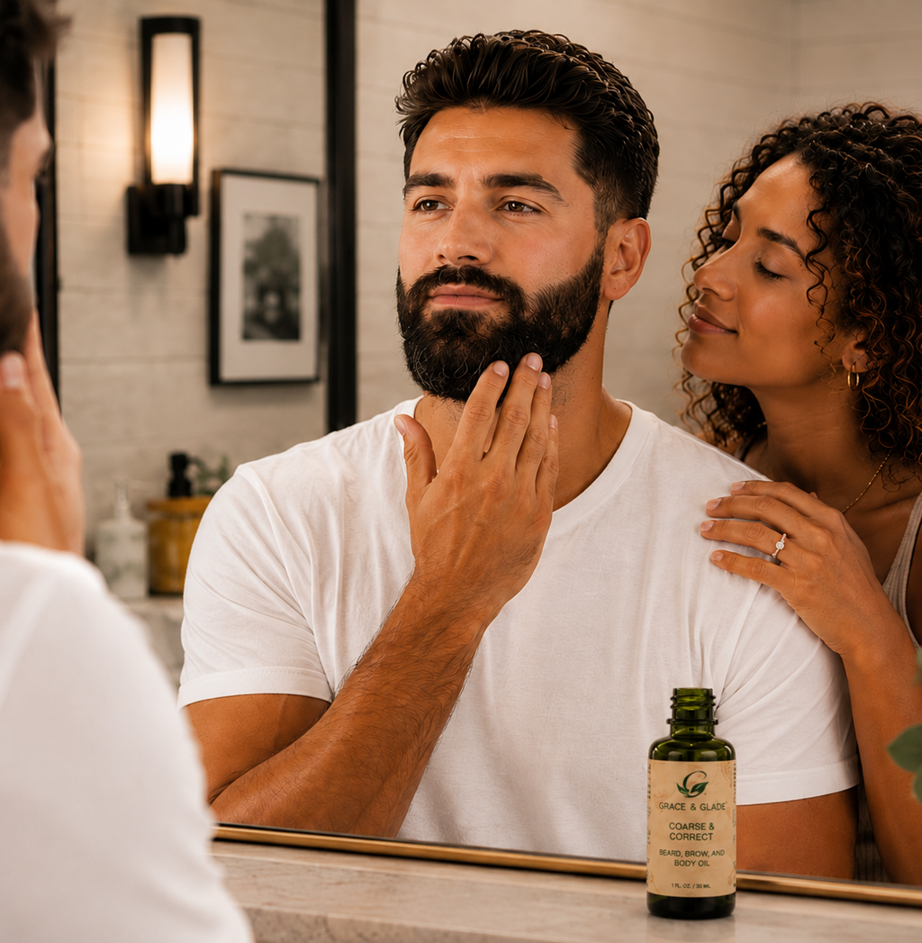 Grace and Glade, Coarse and Correct Beard, Brow, and Body Oil Glass Dropper bottle next to a man with a beard touching his chin in front of a mirror, with a woman standing beside him.